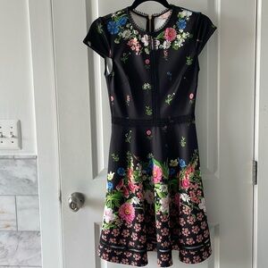 Ted Baker, Size 0, Mid length, black dress with flowers.